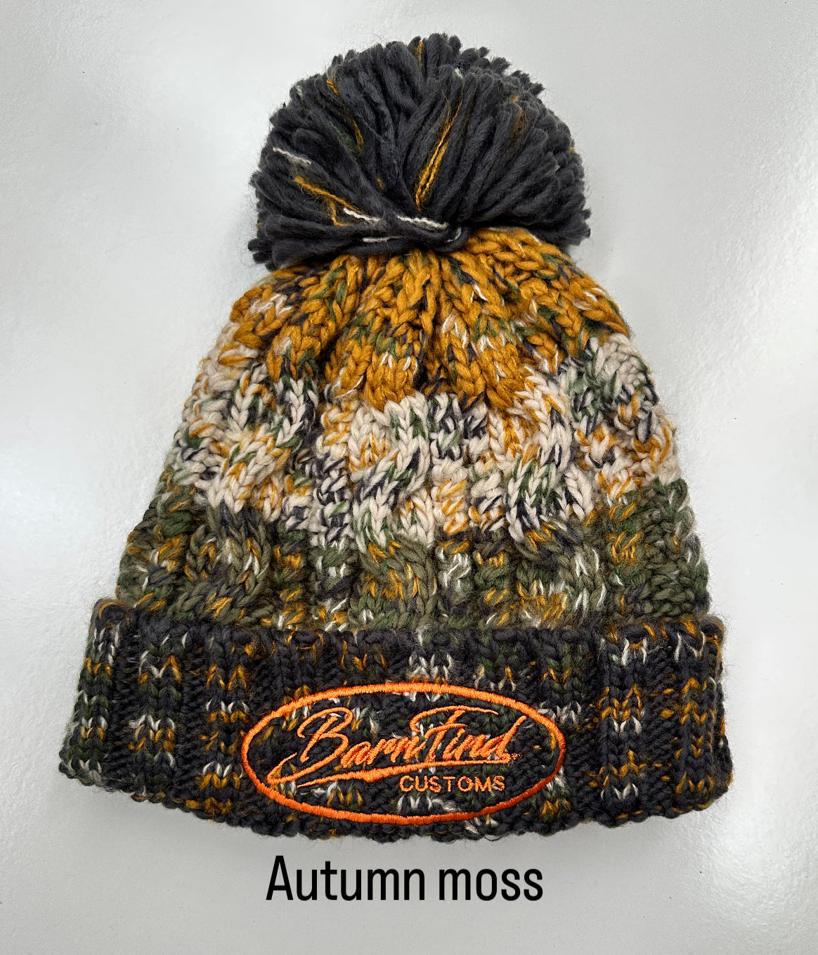 Corkscrew bobble hat