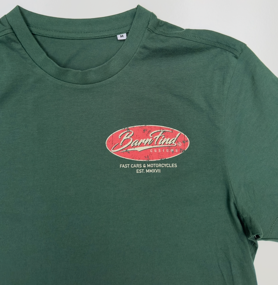Oval tee racing green