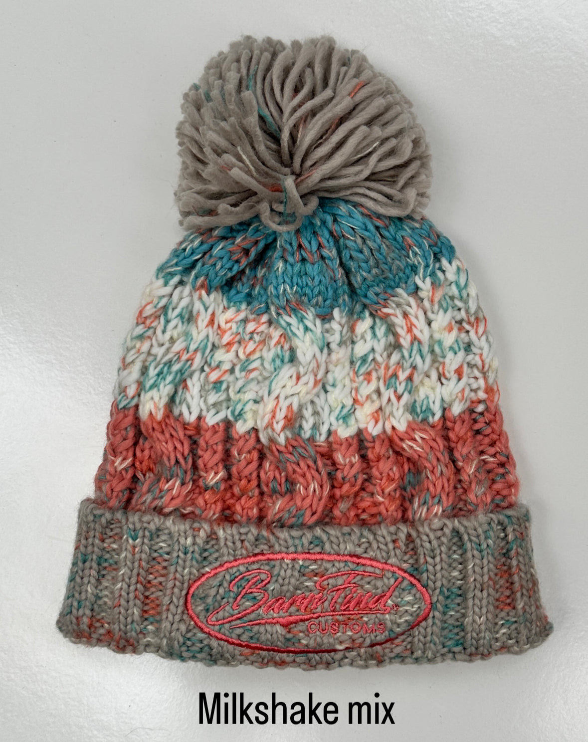 Corkscrew bobble hat