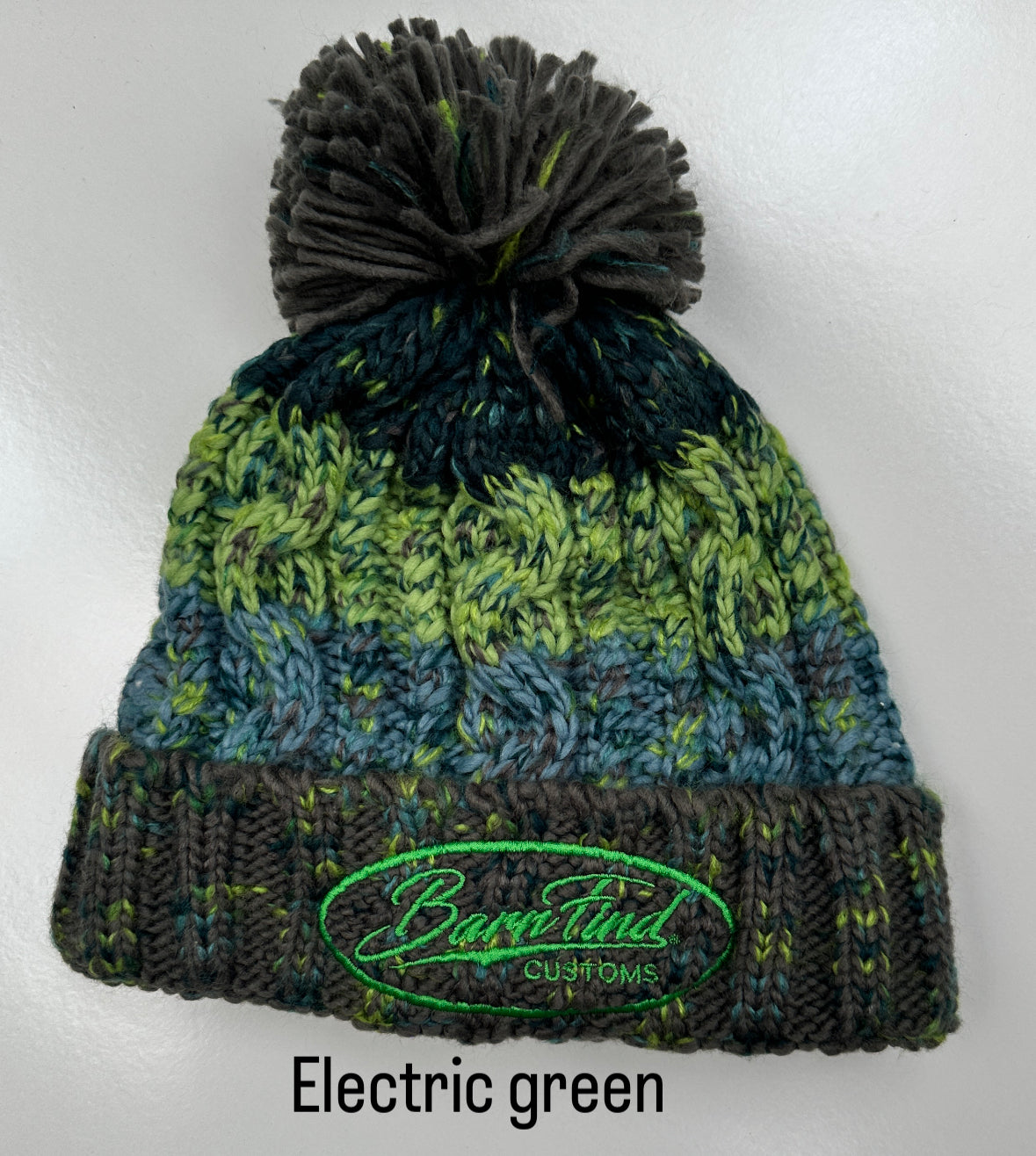 Corkscrew bobble hat